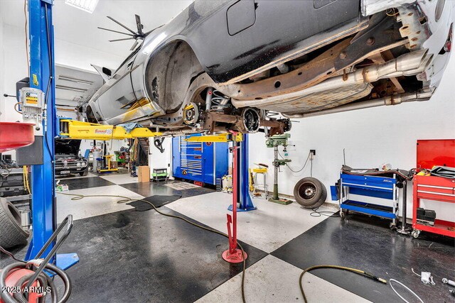 garage with a workshop area