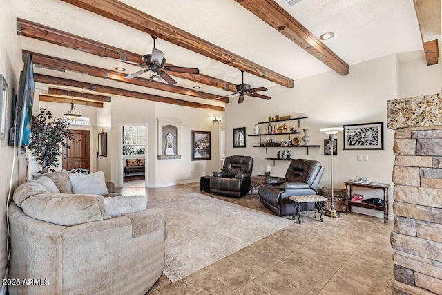 living room with baseboards, a ceiling fan, and beam ceiling