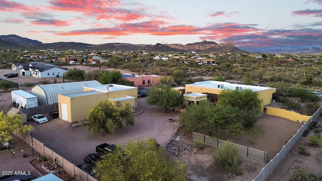 drone / aerial view featuring a residential view and a mountain view