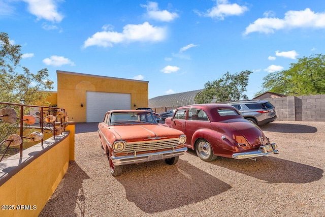 view of parking with a garage