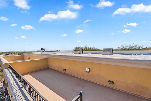 view of patio with a balcony