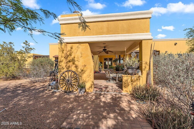 view of patio / terrace with a ceiling fan