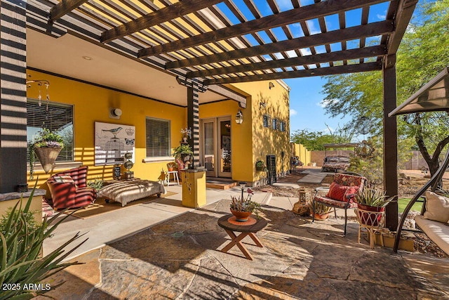 view of patio with a pergola and fence