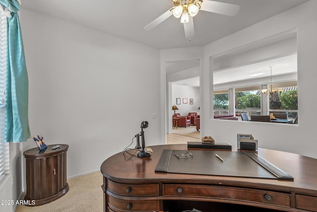 home office with light colored carpet and ceiling fan