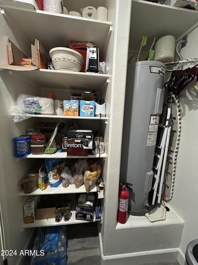 pantry with electric water heater