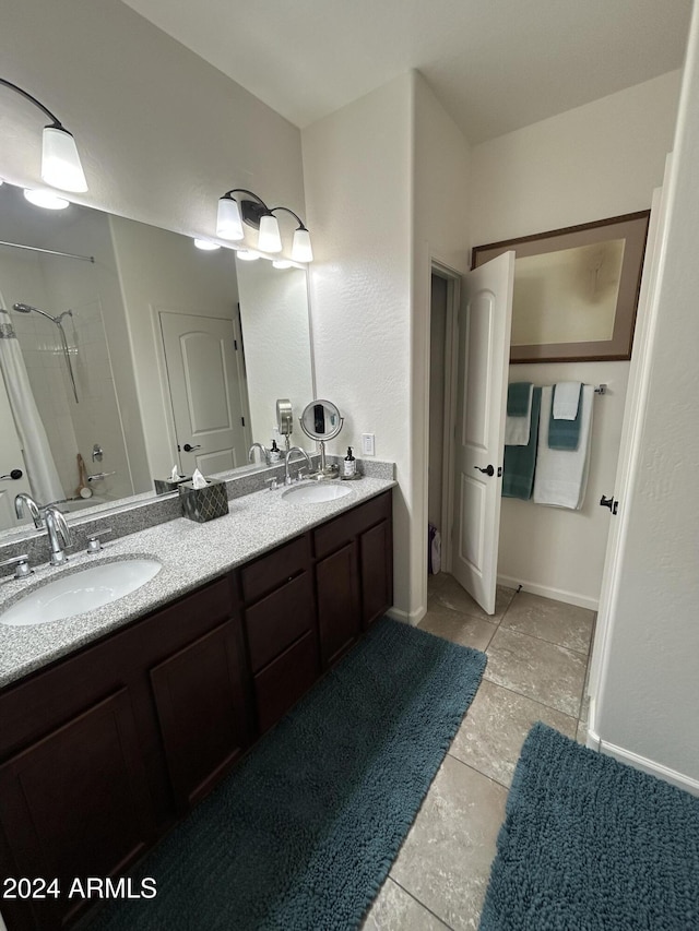 bathroom featuring tile patterned flooring, vanity, and shower / washtub combination