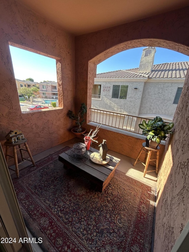 view of patio / terrace with a balcony