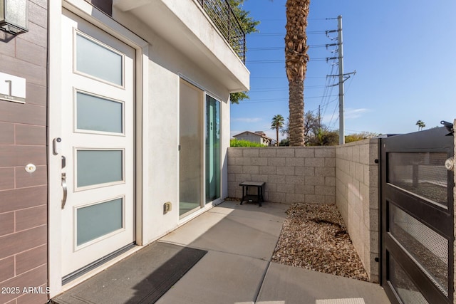 view of home's exterior with a patio area