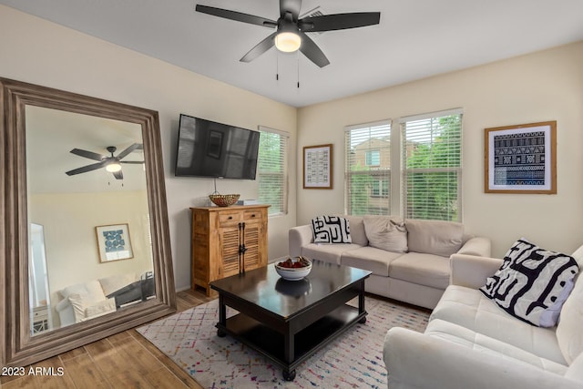 2031 N 77th Ln, Phoenix, AZ 85035 - living area with ceiling fan and wood finished floors