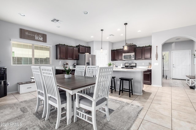 dining room featuring light tile patterned flooring