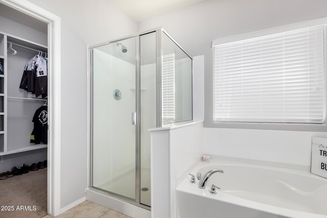 bathroom featuring plus walk in shower