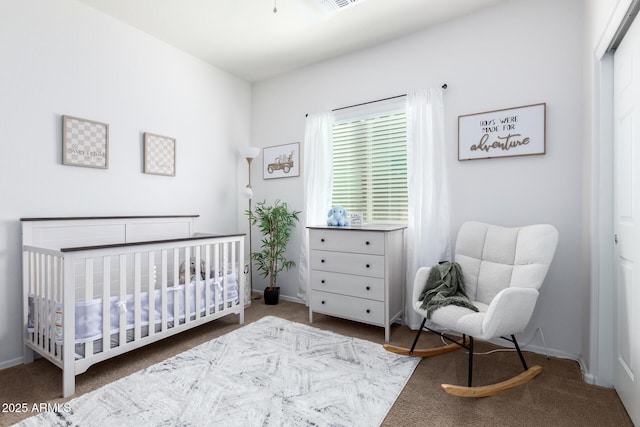 bedroom with a nursery area