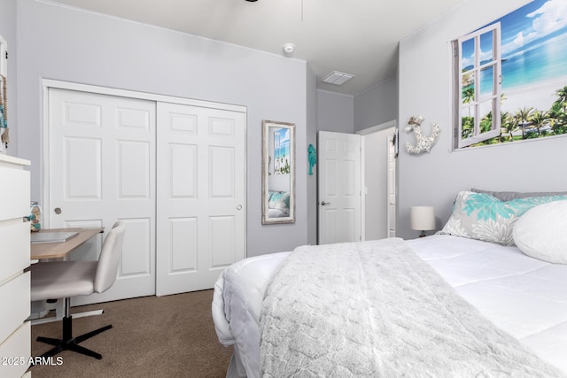 carpeted bedroom featuring a closet