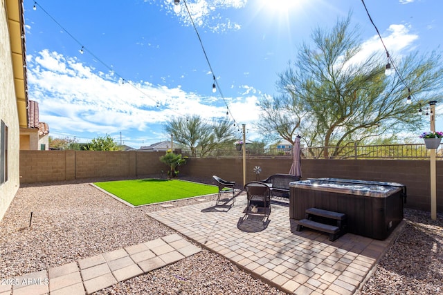 view of patio featuring a hot tub