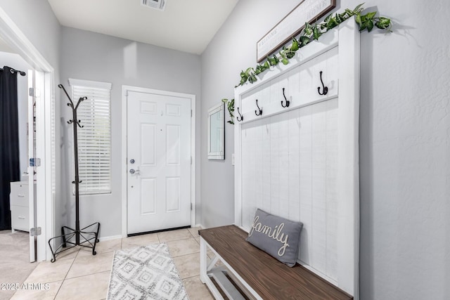 mudroom with light tile patterned floors