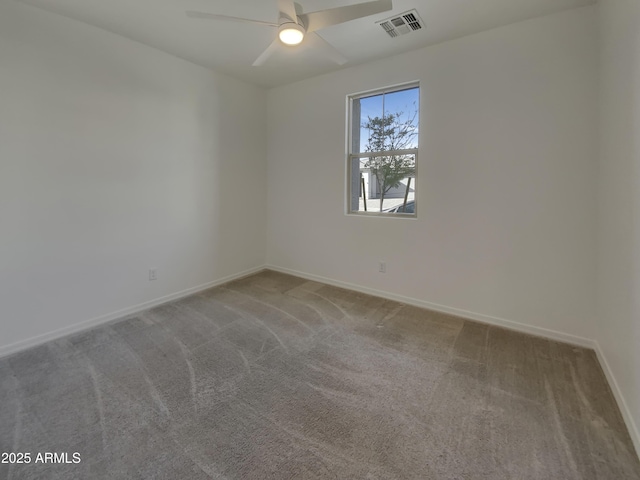 unfurnished room featuring a ceiling fan, baseboards, visible vents, and carpet floors