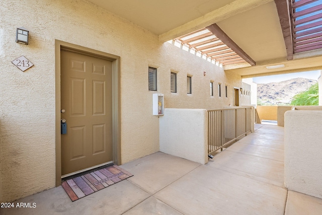 doorway to property featuring a mountain view