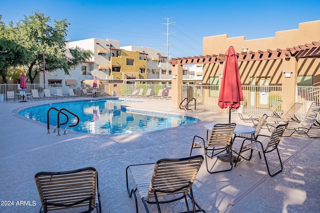 view of pool featuring a patio area