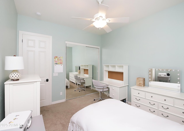 bedroom with ceiling fan and carpet