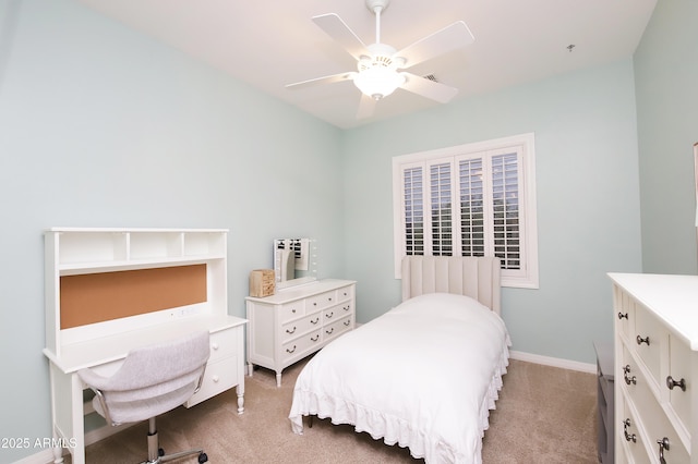 bedroom featuring visible vents, baseboards, a ceiling fan, light colored carpet, and radiator heating unit