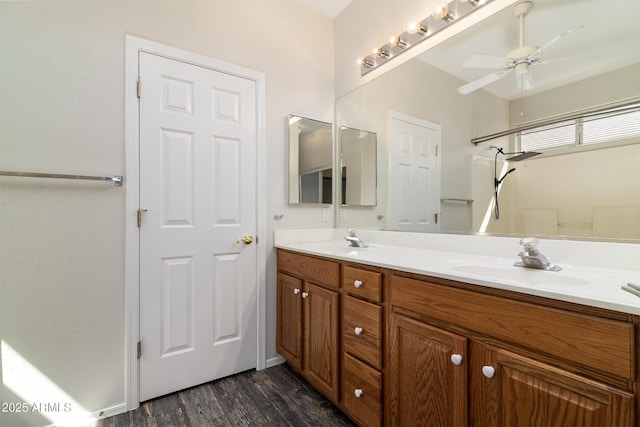 2641 E Brooks St, Gilbert, AZ 85296 - bathroom with double vanity, a sink, a ceiling fan, and wood finished floors