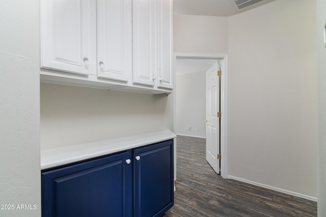 2641 E Brooks St, Gilbert, AZ 85296 - interior space featuring baseboards, visible vents, and dark wood-type flooring