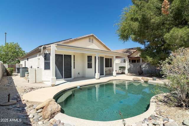 2641 E Brooks St, Gilbert, AZ 85296 - rear view of house featuring a patio area, central AC, a fenced in pool, a fenced backyard, and stucco siding