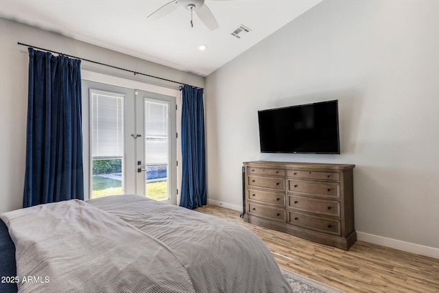 4132 N 42nd St, Phoenix, AZ 85018 - bedroom with french doors, access to outside, baseboards, wood finished floors, and lofted ceiling