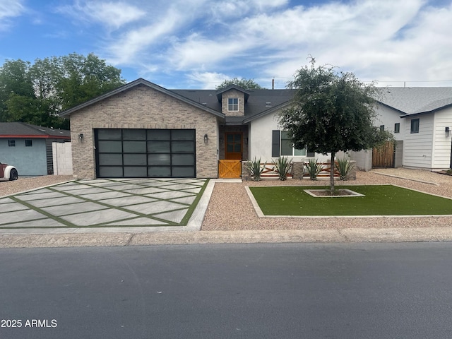 4132 N 42nd St, Phoenix, AZ 85018 - view of front of property with driveway, an attached garage, and a front lawn