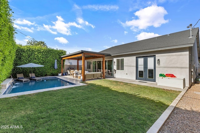 4132 N 42nd St, Phoenix, AZ 85018 - back of property with an outdoor hangout area, french doors, stucco siding, a yard, and a patio area