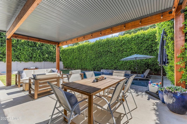 4132 N 42nd St, Phoenix, AZ 85018 - fenced backyard featuring a patio, outdoor lounge area, and outdoor dining area