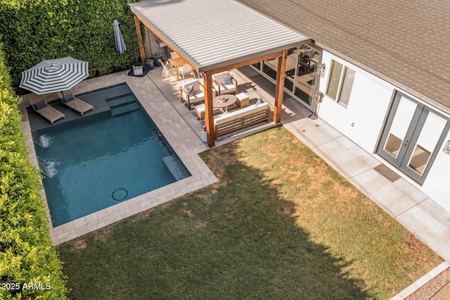 4132 N 42nd St, Phoenix, AZ 85018 - swimming pool featuring french doors, a patio area, a yard, and an outdoor hangout area