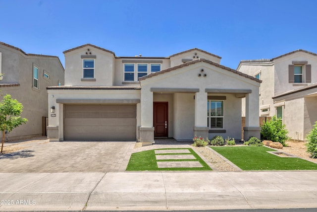 24314 N 21st Pl, Phoenix, AZ 85024 - view of front of home with driveway, stucco siding, an attached garage, and a front lawn