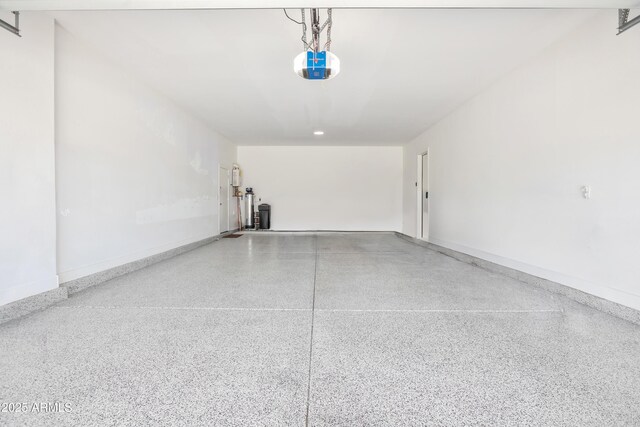 24314 N 21st Pl, Phoenix, AZ 85024 - garage featuring a garage door opener and baseboards