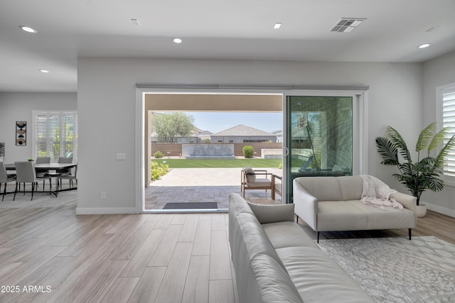 24314 N 21st Pl, Phoenix, AZ 85024 - living area with wood finished floors, recessed lighting, and baseboards