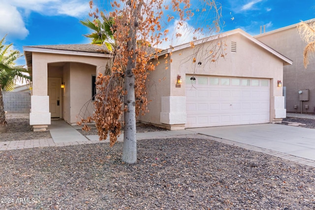 view of front of property with a garage