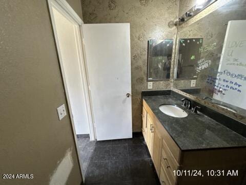 bathroom with vanity and tile patterned floors