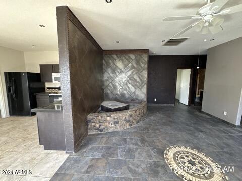 living room featuring ceiling fan