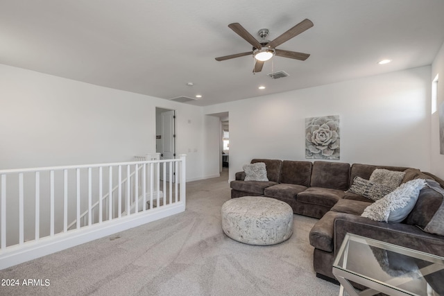 living room with carpet floors and ceiling fan