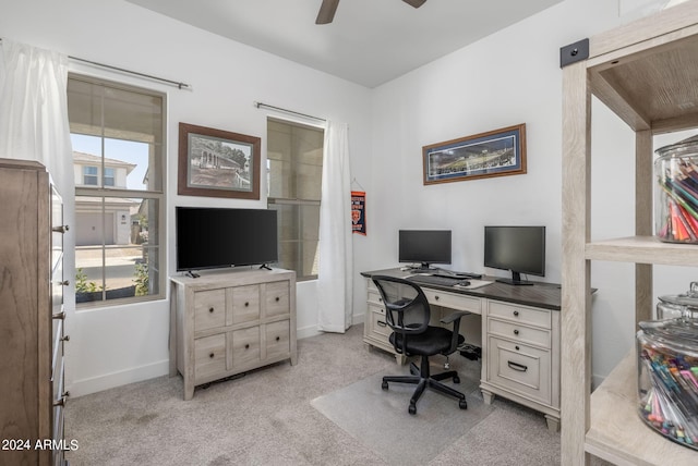 home office with light colored carpet and ceiling fan