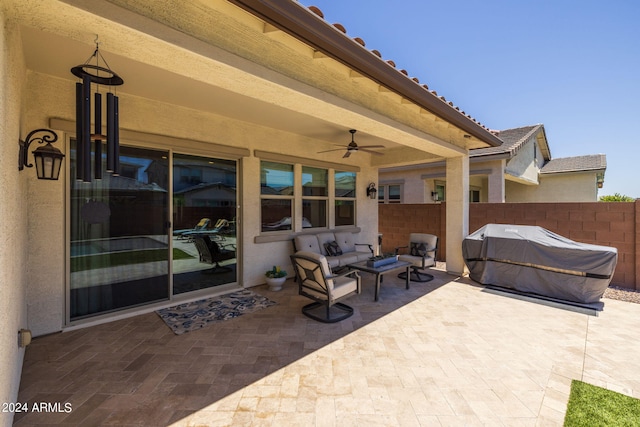 view of terrace featuring ceiling fan and outdoor lounge area