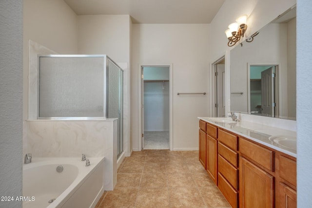 bathroom with vanity, plus walk in shower, and tile patterned flooring