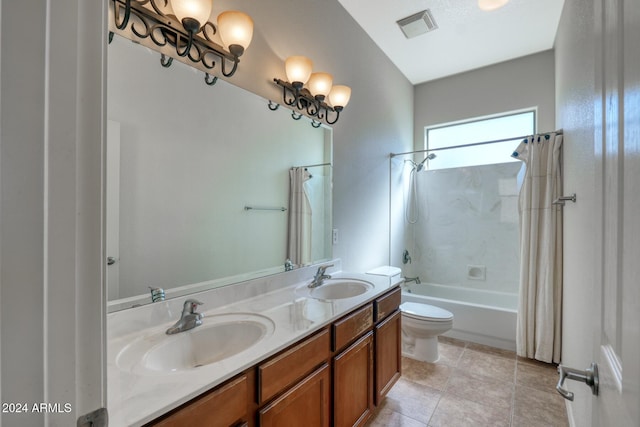 full bathroom with vanity, toilet, tile patterned floors, and shower / tub combo with curtain