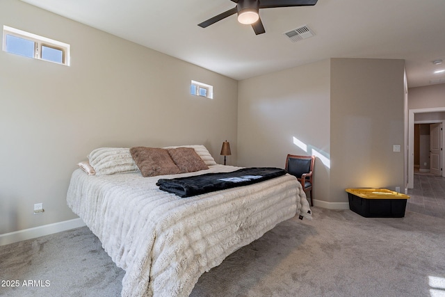 bedroom featuring ceiling fan and light colored carpet