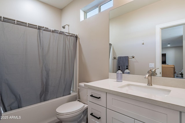 full bathroom with toilet, shower / bathtub combination with curtain, and vanity