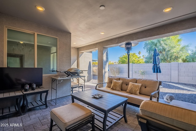 sunroom featuring a wealth of natural light