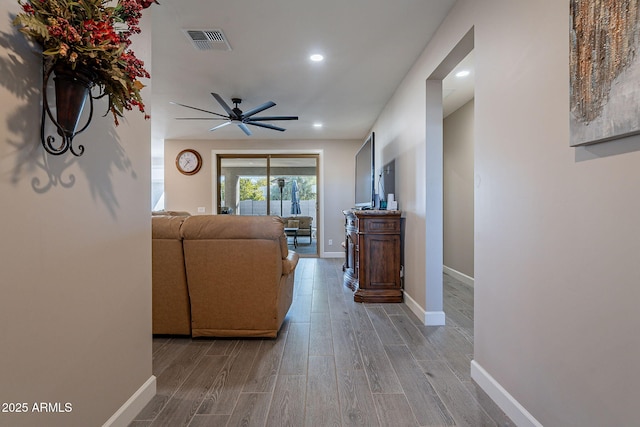 living room with ceiling fan