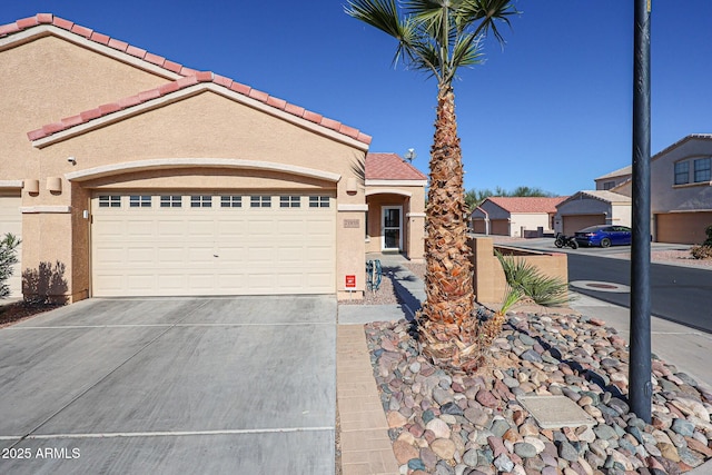 view of front of property with a garage