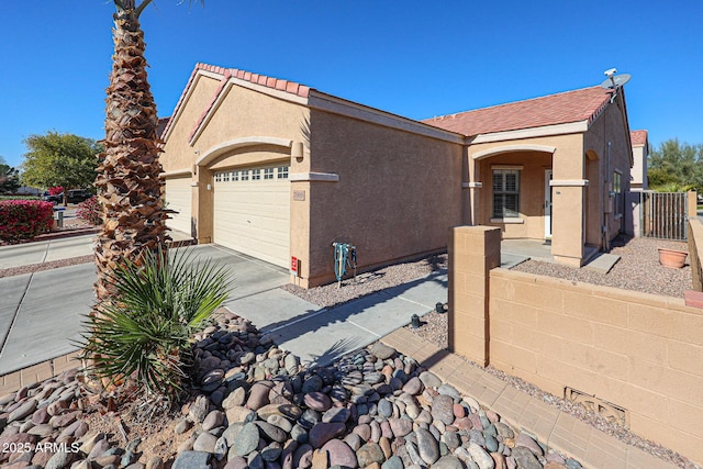 single story home with a garage