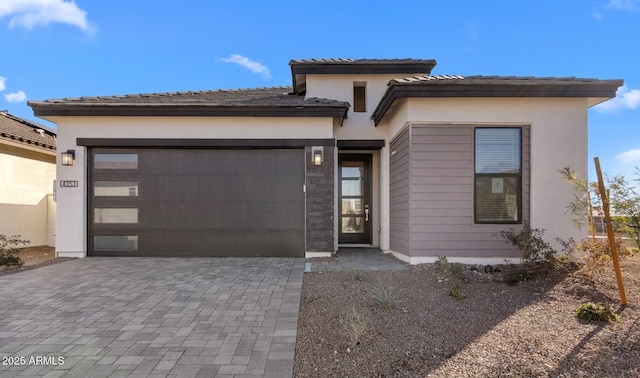 prairie-style home with a garage